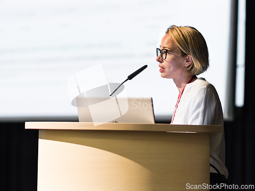 Image of Female speaker giving a talk on corporate business conference. Business and Entrepreneurship event.