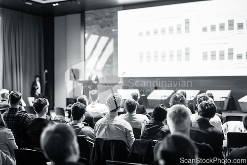 Image of Speaker giving a talk in conference hall at business event. Business and entrepreneurship concept. Black and white image.