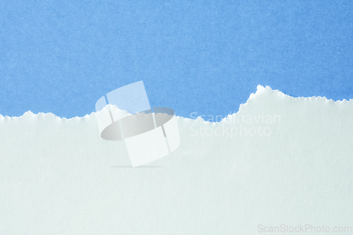 Image of blue and white color torn paper background