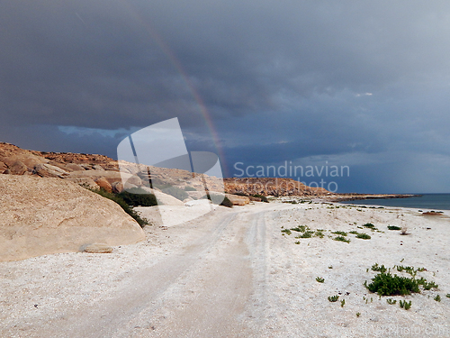 Image of Rainbow over the sea.