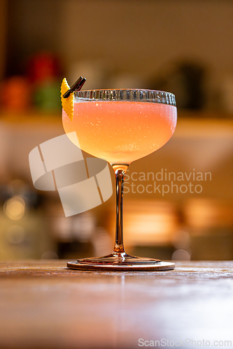 Image of Pink cocktail served in a coupe glass