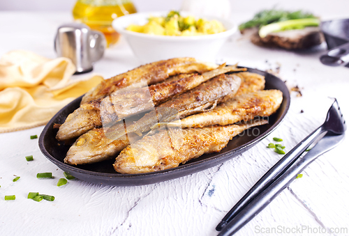Image of Fish fried with lemon and aroma spice