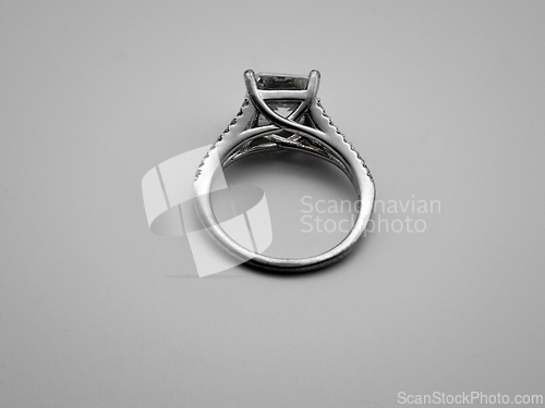 Image of Silver ring with a stone.