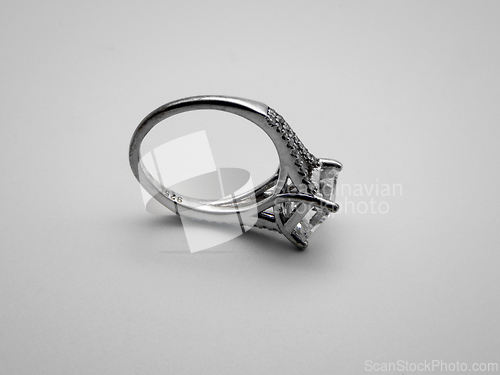 Image of Silver ring with a stone.