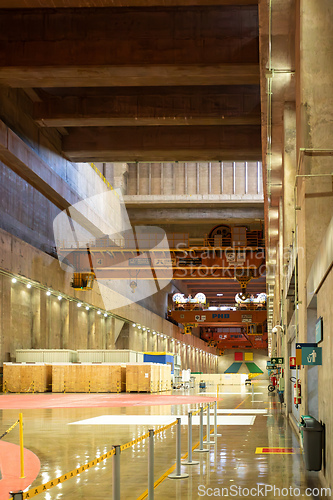 Image of Immense hall inside binational facility, highlighting scale needed for generator assembly and repair. Itaipu Binacional, Brazil