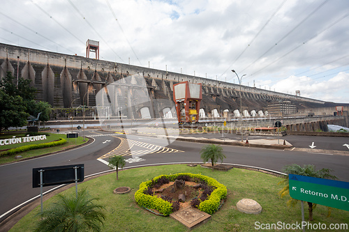 Image of Concrete wall of the Itaipu Hydroelectric Plant dominates above the facility complex road network. Itaipu Binacional, Brazil