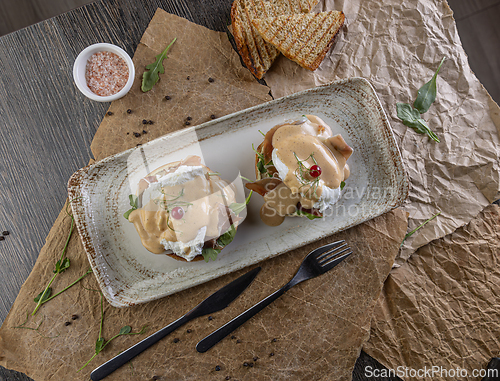 Image of Top view of eggs benedict