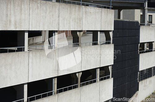 Image of an exterior view of a multi-story parking garage