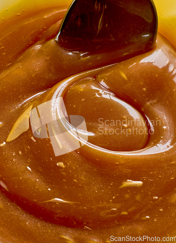 Image of freshly cooked homemade caramel sauce background