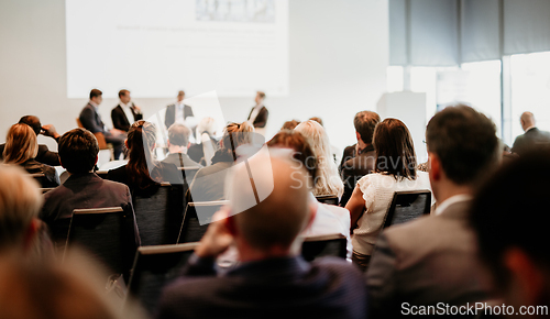 Image of Interview and round table discussion at business convention and presentation. Audience at the conference hall. Business and entrepreneurship symposium