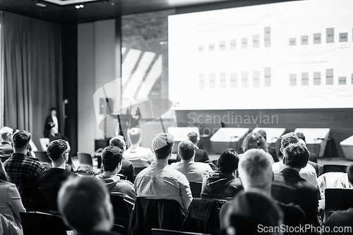 Image of Speaker giving a talk in conference hall at business event. Business and entrepreneurship concept. Black and white image.