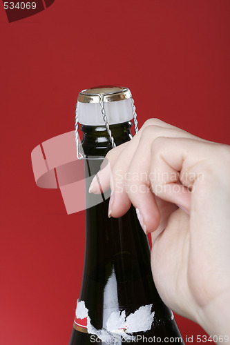 Image of Opening champagne bottle