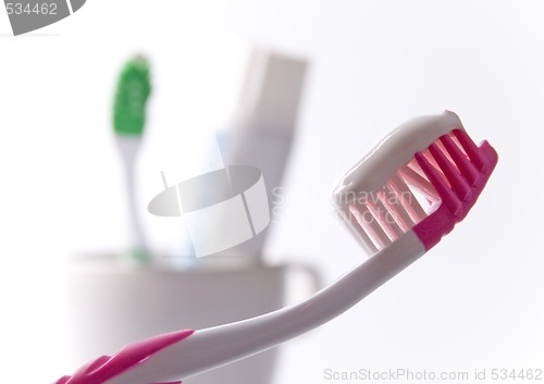 Image of toothbrushe and toothpaste