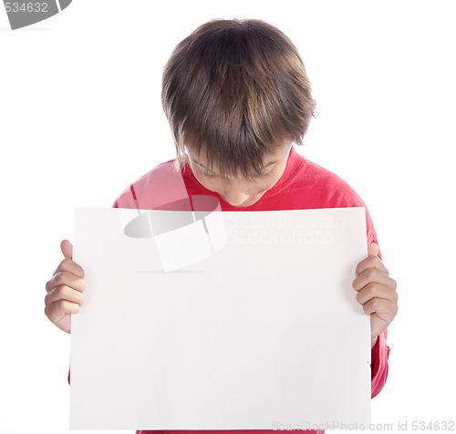 Image of boy looking at placard 