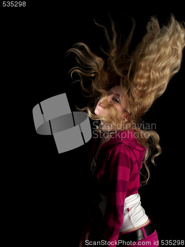 Image of Teen beauty shaking hair