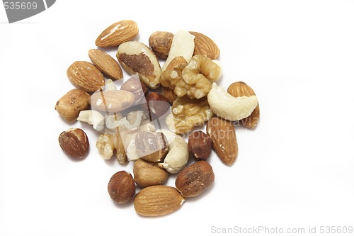 Image of mixed nuts over a white background