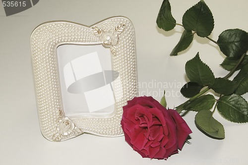 Image of red rose and pearl picture frame