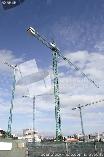 Image of large cranes on site