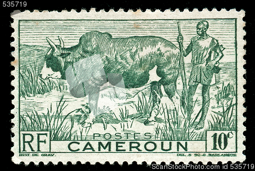 Image of vintage stamp from cameroon depicting tribal farmer