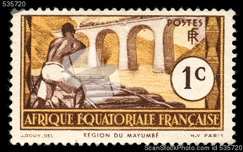 Image of vintage stamp from Africa depicting railroad worker