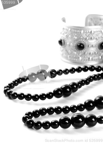 Image of bracelet and black necklace