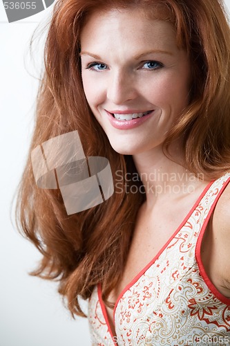 Image of Pretty red hair woman