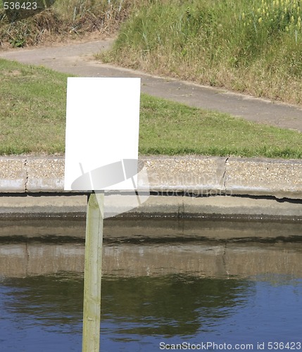 Image of white signpost