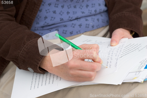 Image of Woman Grading Papers
