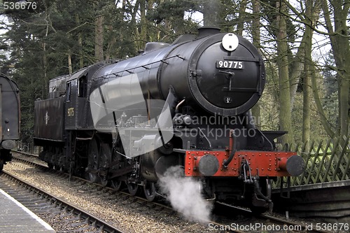 Image of old black steam engine