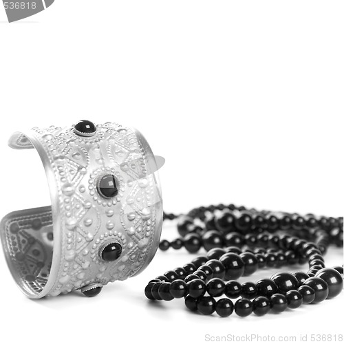 Image of bracelet and black necklace