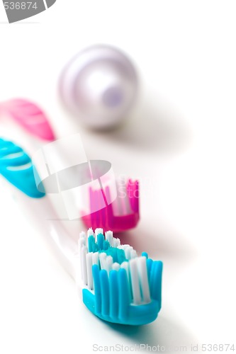 Image of toothpaste and toothbrushes