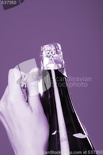 Image of Opening champagne bottle