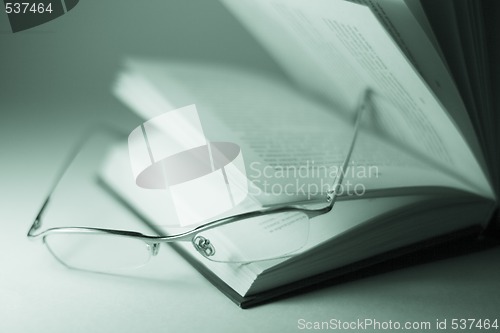 Image of book and glasses