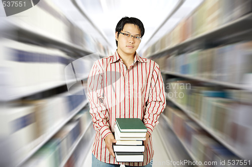 Image of College student at library