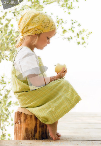 Image of child with apple