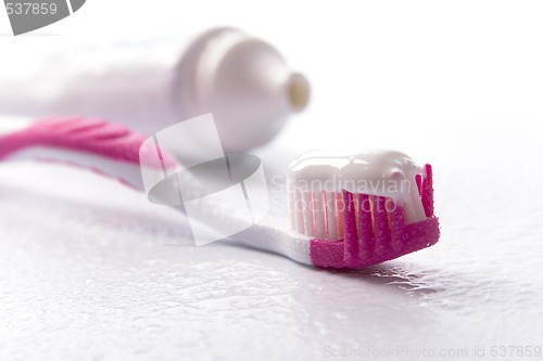 Image of toothpaste and toothbrush