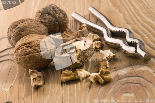 Image of walnuts and nutcracker