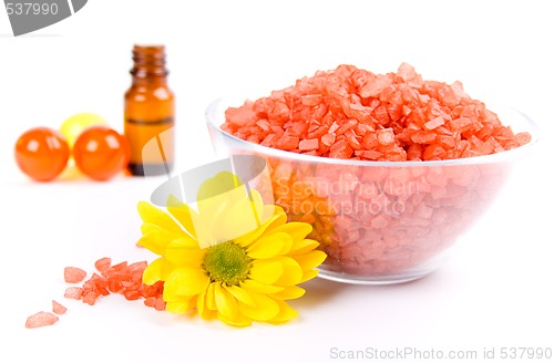 Image of bath salt, oil balls in a bowl and flower