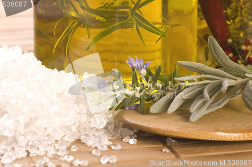 Image of herbs and spices. rosemary, lavender, salt and olive