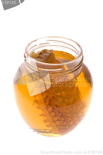 Image of fresh honey with honeycomb