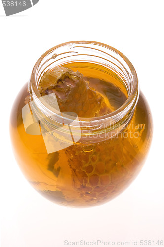 Image of fresh honey with honeycomb