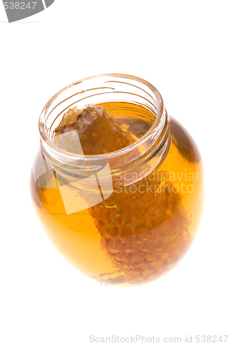 Image of fresh honey with honeycomb