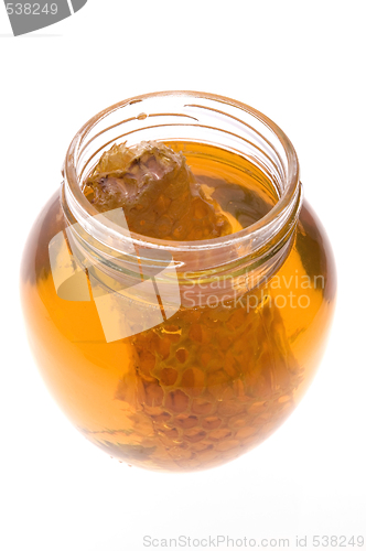 Image of fresh honey with honeycomb