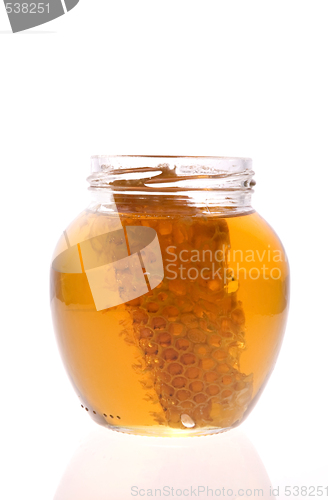 Image of fresh honey with honeycomb