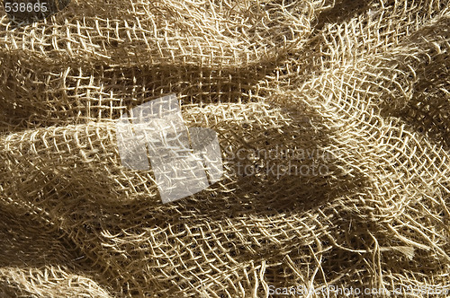 Image of sunny burlap background