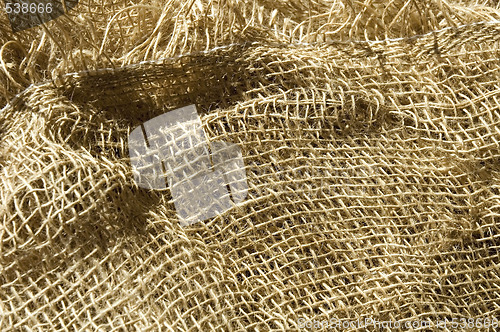 Image of sunny burlap background