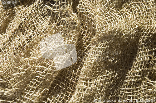 Image of sunny burlap background