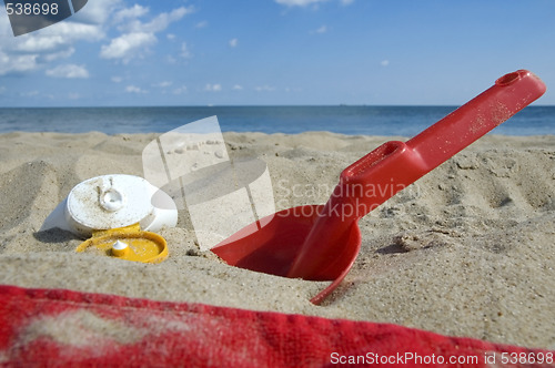 Image of childhood. beach items and sun block