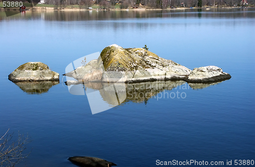 Image of Rocks in a calm lake