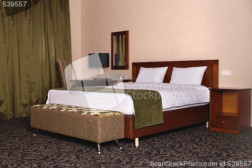 Image of Part of interior of hotel bedroom